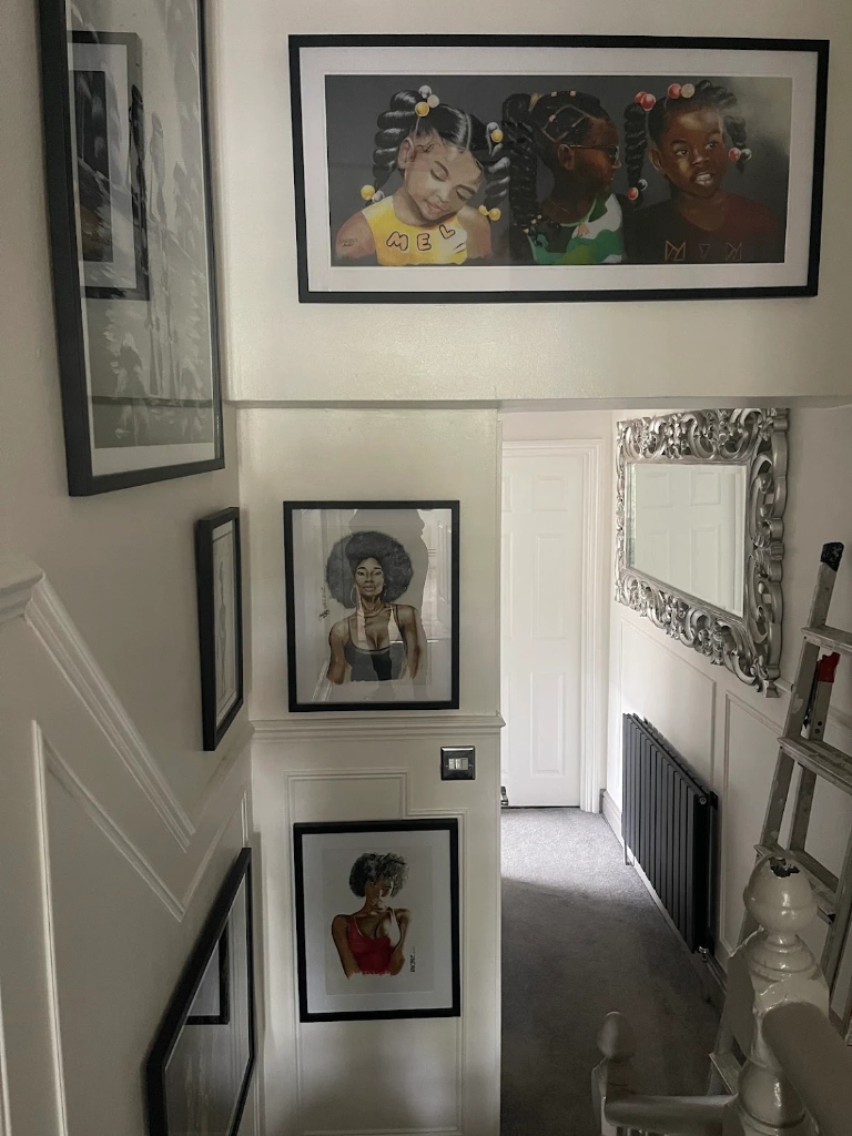 Framed Artworks on Staircase